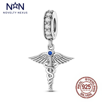 Sterling Silver Caduceus Charm with Sparkling Crystals and Sapphire Accent, Symbolizing Health and Wisdom