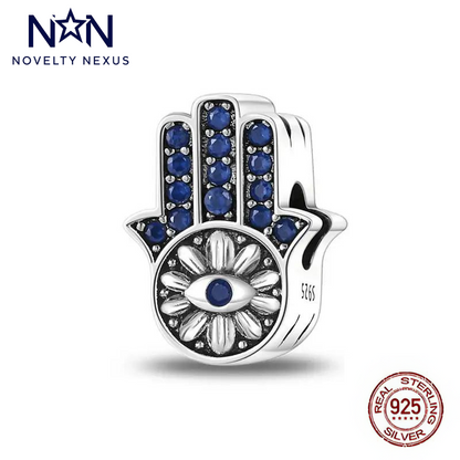 "Hamsa Hand Charm" 925 Sterling Silver with Blue Sapphire Accents